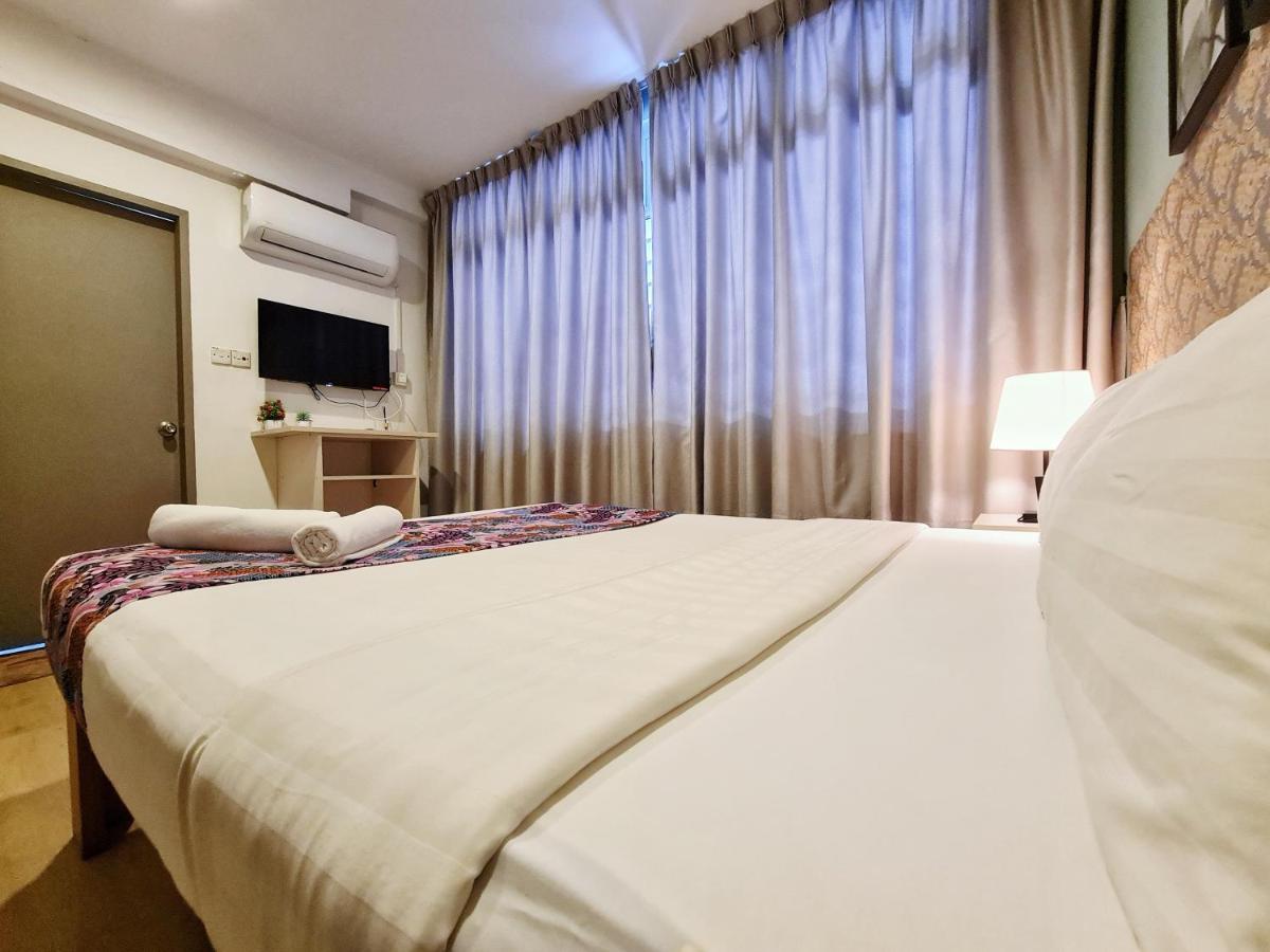 Treeline Urban Inn Kota Kinabalu Exterior foto